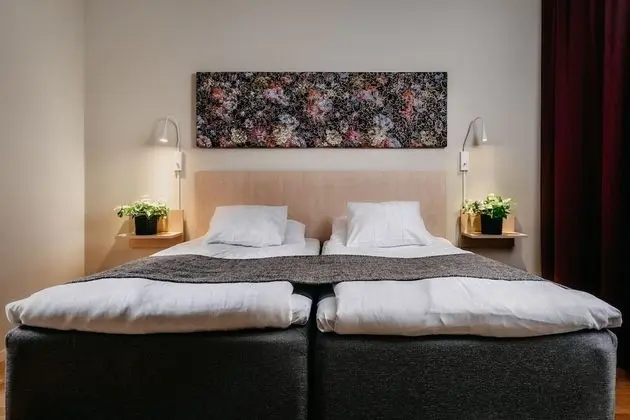 Üç Kişilik Oda (1 single bed and 1 sofa bed)