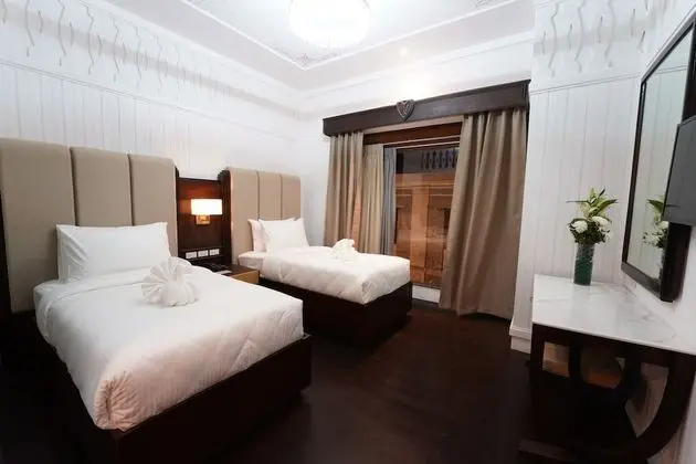 Deluxe Tek Büyük veya İki Ayrı Yataklı Oda
