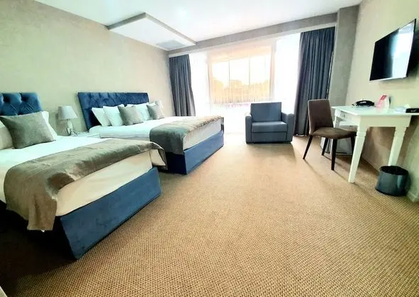 Deluxe Üç Kişilik Oda