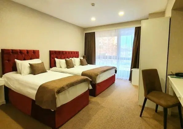 Deluxe Üç Kişilik Oda