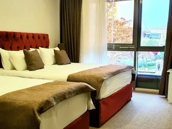 Deluxe Üç Kişilik Oda
