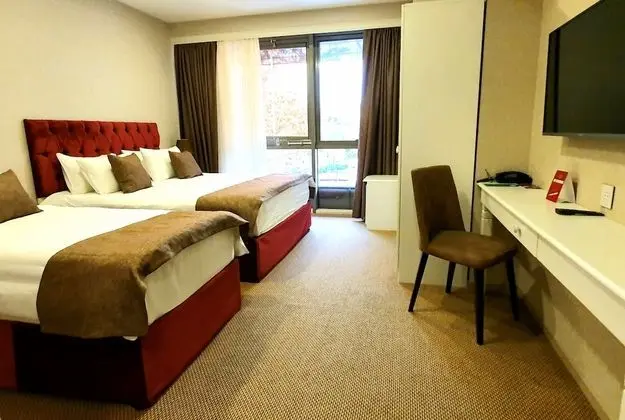 Deluxe Üç Kişilik Oda