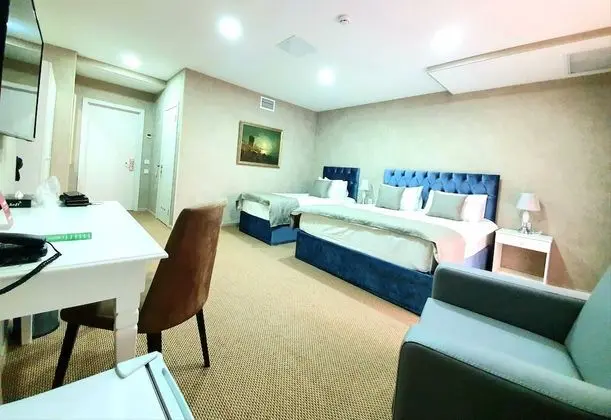Deluxe Üç Kişilik Oda