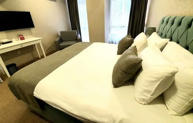 Deluxe Üç Kişilik Oda