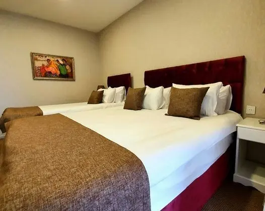 Deluxe Üç Kişilik Oda