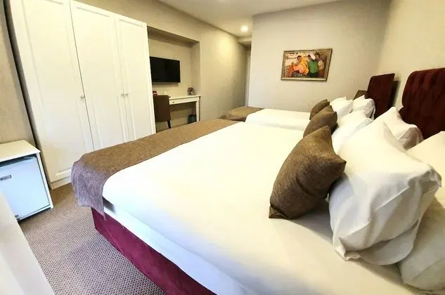 Deluxe Üç Kişilik Oda