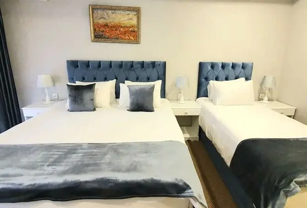 Deluxe Üç Kişilik Oda