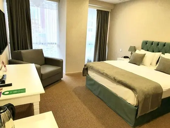 Deluxe Üç Kişilik Oda