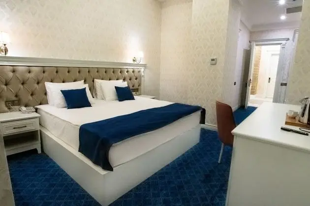 Deluxe Tek Büyük veya İki Ayrı Yataklı Oda, Balkon