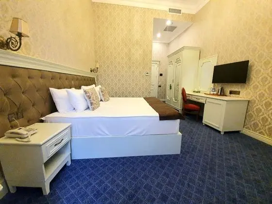 Deluxe Tek Büyük veya İki Ayrı Yataklı Oda, Balkon