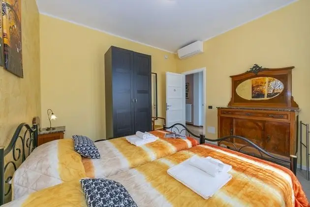 Family Apart Daire, Birden Çok Yatak, 2 Banyolu, Bahçeli (La Maison Fleurie Appartamento Giglio)