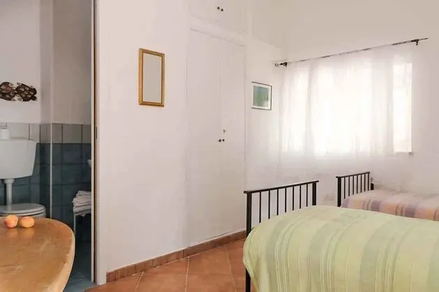 Tek Büyük veya İki Ayrı Yataklı Oda, Bahçe Manzaralı