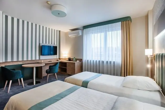 Comfort Tek Büyük veya İki Ayrı Yataklı Oda