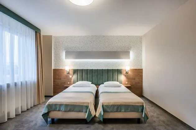 Comfort Tek Büyük veya İki Ayrı Yataklı Oda