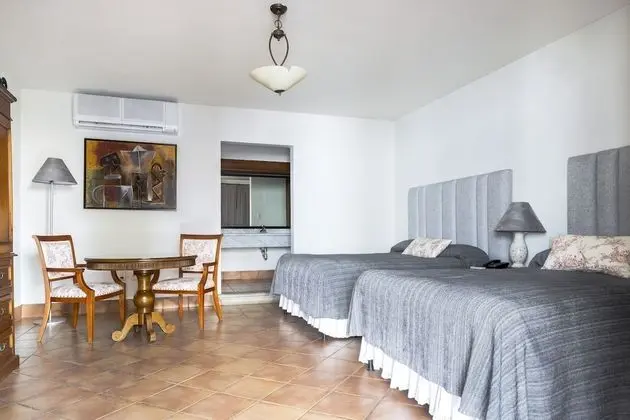 Junior Suite, dos camas matrimoniales