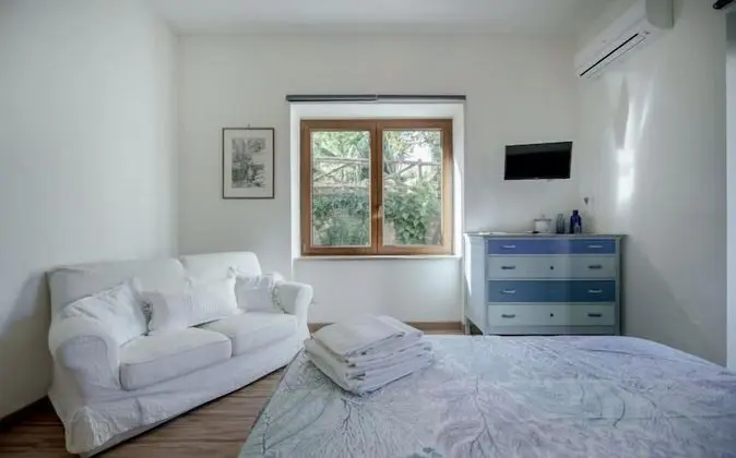 Deluxe Üç Kişilik Oda, Bahçe Manzaralı