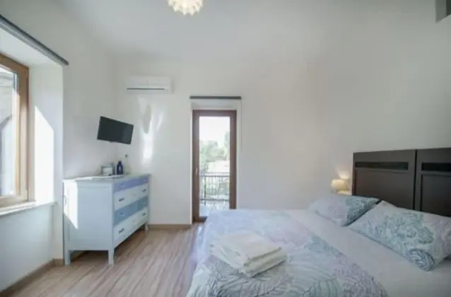 Deluxe Üç Kişilik Oda, Bahçe Manzaralı