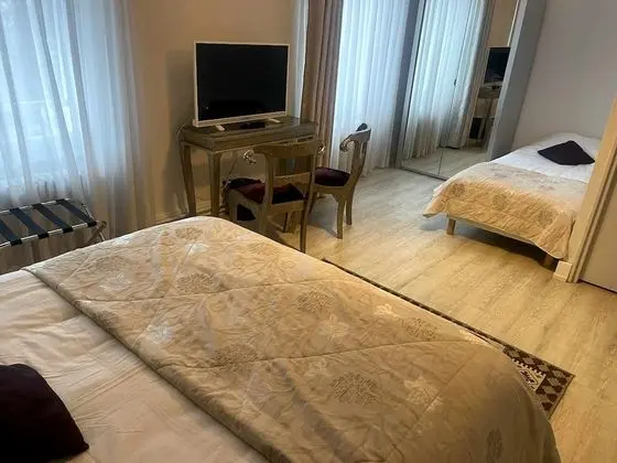 Üç Kişilik Oda