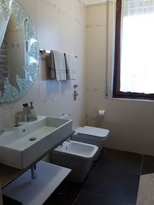 Deluxe Tek Büyük veya İki Ayrı Yataklı Oda (Rossana)