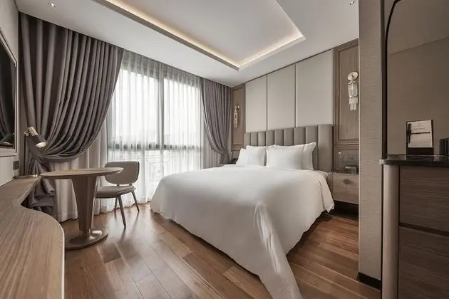 Deluxe Tek Büyük veya İki Ayrı Yataklı Oda