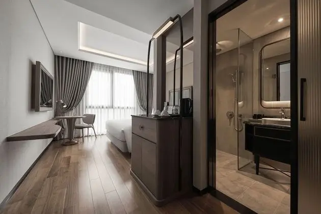 Deluxe Tek Büyük veya İki Ayrı Yataklı Oda
