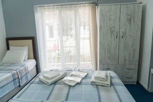 Üç Kişilik Oda