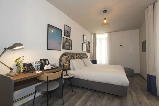 Deluxe Tek Büyük veya İki Ayrı Yataklı Oda