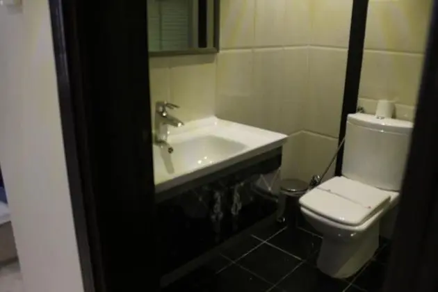 Deluxe Tek Büyük veya İki Ayrı Yataklı Oda, Kısmi Deniz Manzaralı