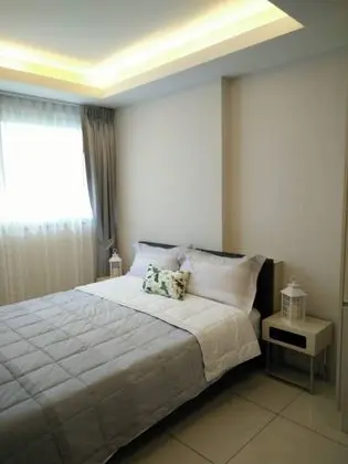 one bedroom with balcony pool view