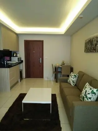 one bedroom with balcony pool view