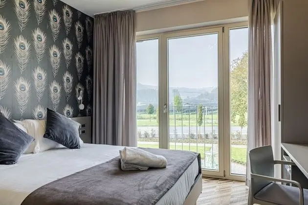 Deluxe Tek Büyük veya İki Ayrı Yataklı Oda
