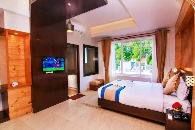 Deluxe Tek Büyük veya İki Ayrı Yataklı Oda