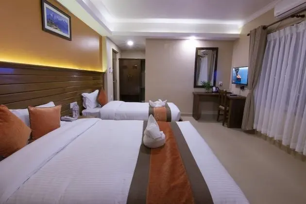 Deluxe Tek Büyük veya İki Ayrı Yataklı Oda
