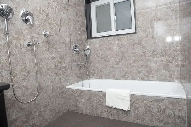 Deluxe Tek Büyük veya İki Ayrı Yataklı Oda