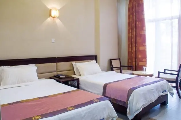 Deluxe Tek Büyük veya İki Ayrı Yataklı Oda