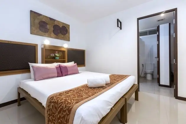 Deluxe Triple Suite (3 adults and 1 child under 6 years old sleeping for free in existing beds)