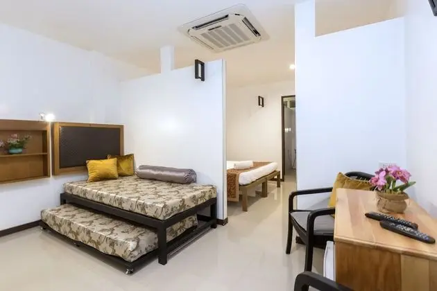 Deluxe Triple Suite (3 adults and 1 child under 6 years old sleeping for free in existing beds)