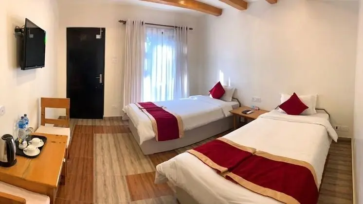 Deluxe Tek Büyük veya İki Ayrı Yataklı Oda