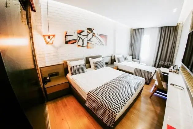 Deluxe Dört Kişilik Oda