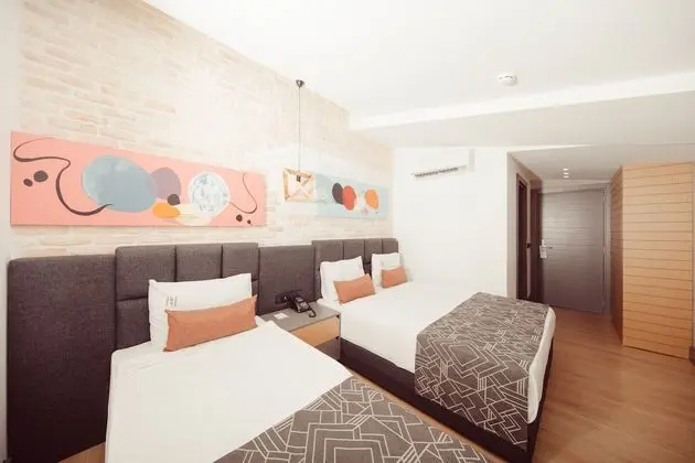 Deluxe Tek Büyük veya İki Ayrı Yataklı Oda