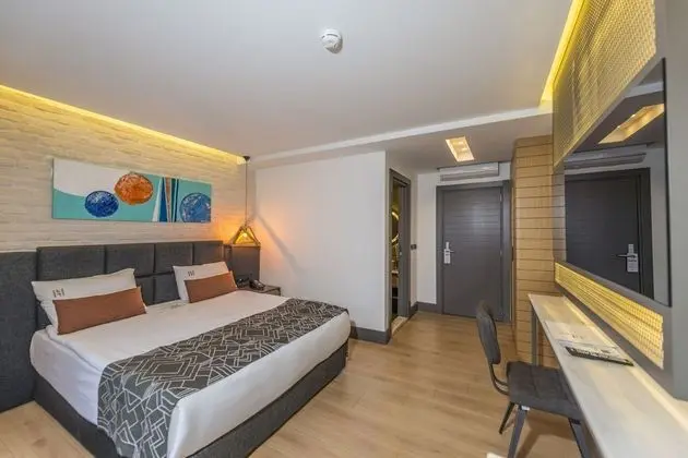 Deluxe Tek Büyük veya İki Ayrı Yataklı Oda