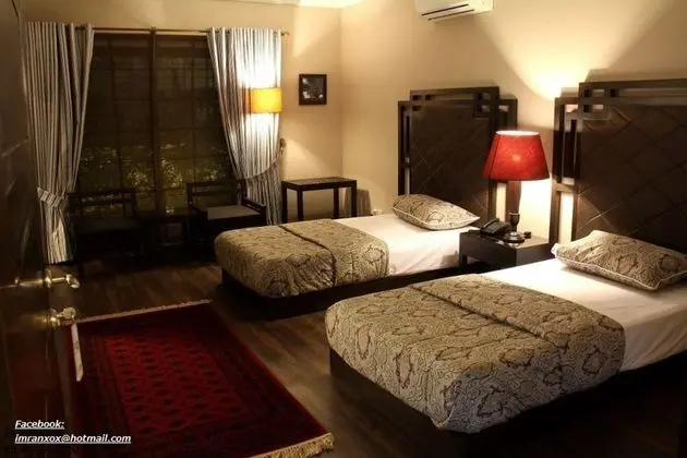 Deluxe Tek Büyük veya İki Ayrı Yataklı Oda