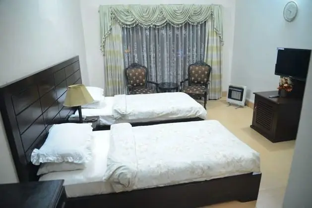 Deluxe Tek Büyük veya İki Ayrı Yataklı Oda