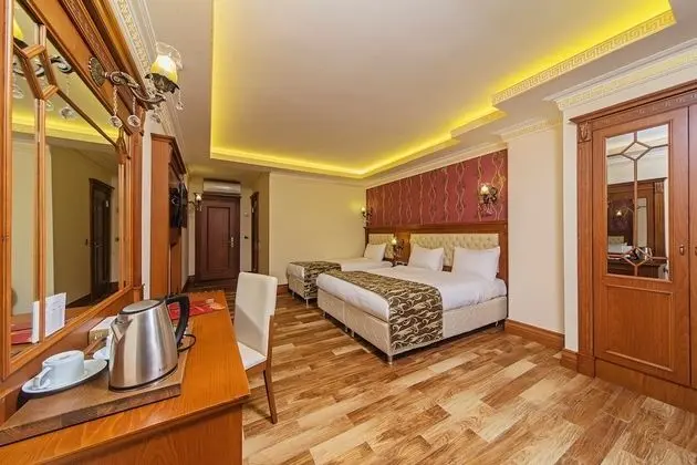 Deluxe Üç Kişilik Oda