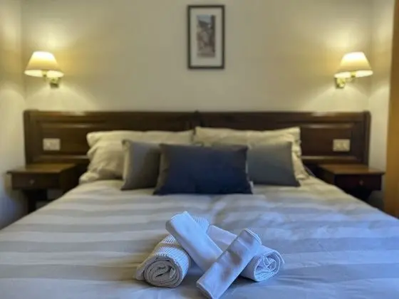 Economy Tek Büyük veya İki Ayrı Yataklı Oda