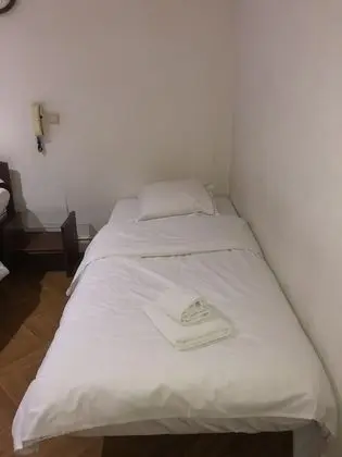 Üç Kişilik Oda