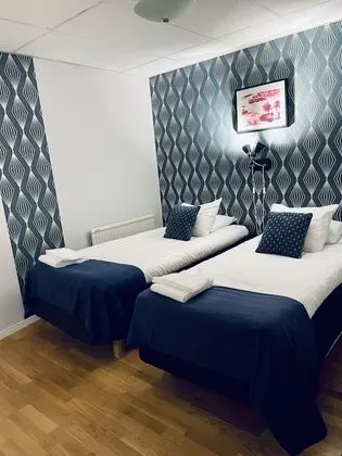 Economy Tek Büyük veya İki Ayrı Yataklı Oda, Ortak Banyo (No window)