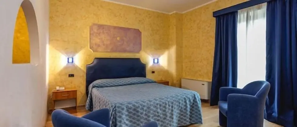 Basic Tek Büyük veya İki Ayrı Yataklı Oda