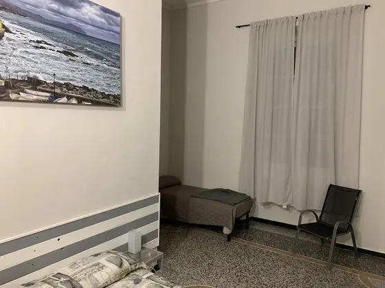 Basic Üç Kişilik Oda, Ortak Banyo