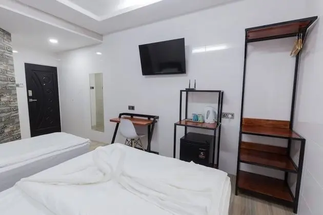 Deluxe Üç Kişilik Oda